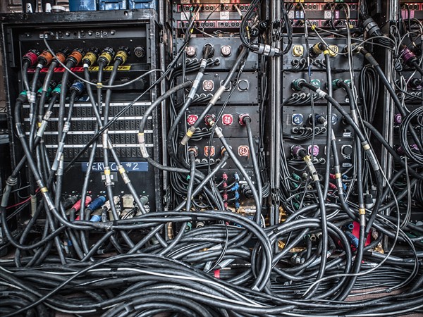 Rear view of audio amplifiers and cables