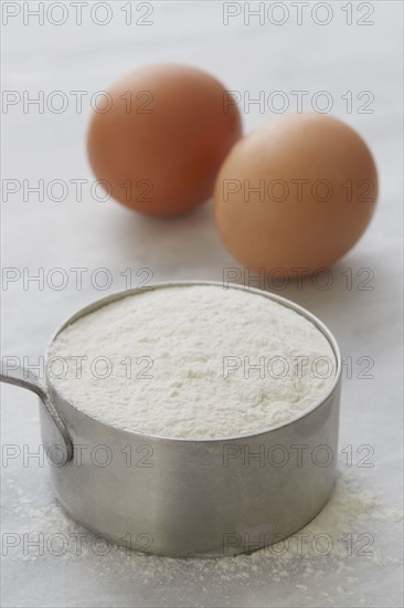 Eggs and cup of flour