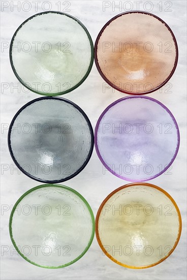 Overhead view of empty colorful glass bowls