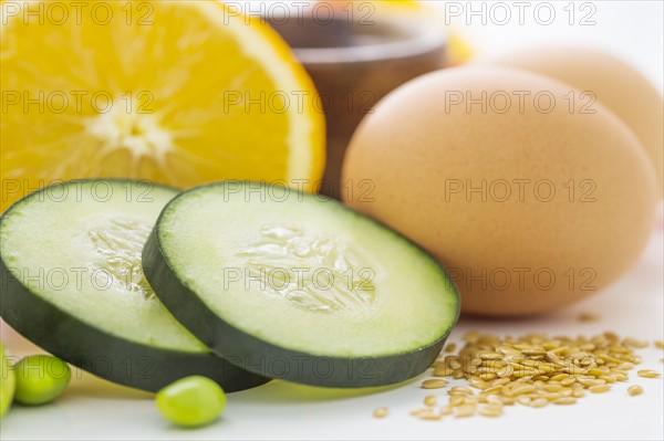 Eggs with slices of cucumber and orange