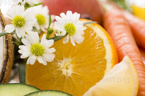 Slice of orange and flower