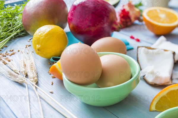 Eggs, oranges and pomegranates