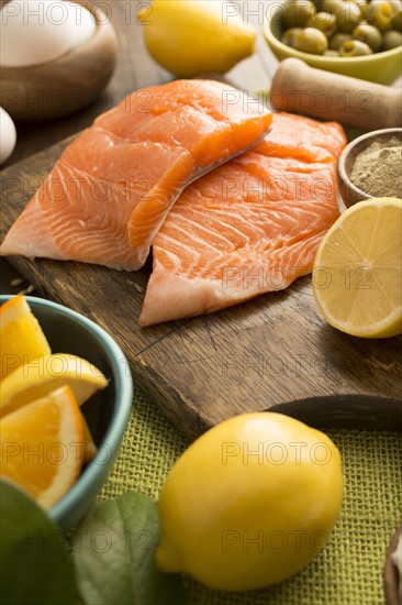 Fresh slices of salmon and lemons