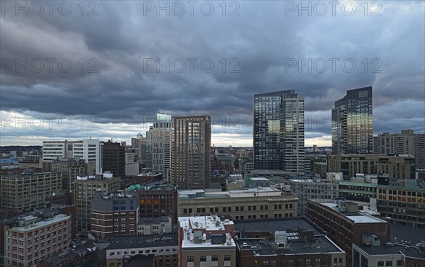 Massachusetts, Boston, City skyline with stormy sky