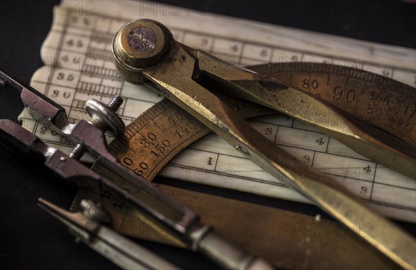 Studio shot of antique instruments of measurement.