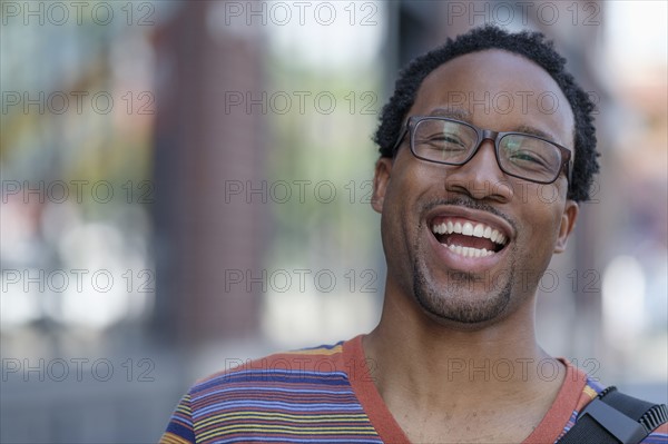 Portrait of smiling mid adult man.