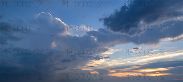 Clouds on sky at sunset.