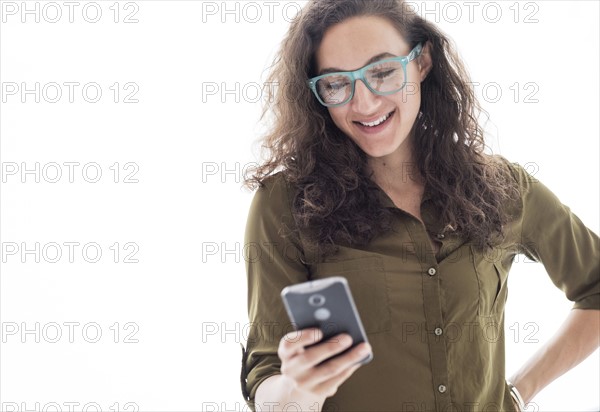 Young woman using smart phone.