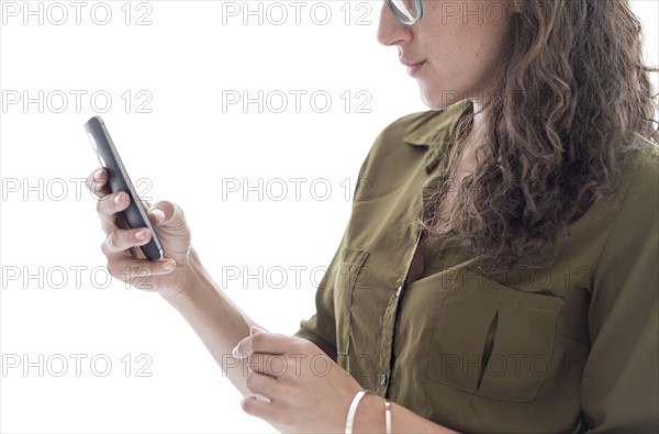 Young woman using smart phone.