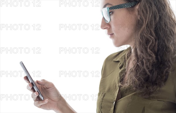 Young woman using smart phone.