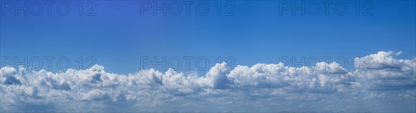 Cloudscape on sunny day.