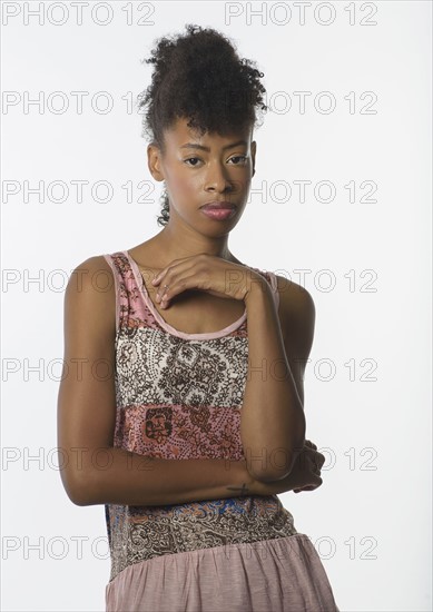 Portrait of fashion model in sleeveless tunic.