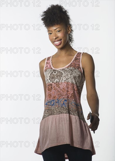 Portrait of fashion model in sleeveless tunic.