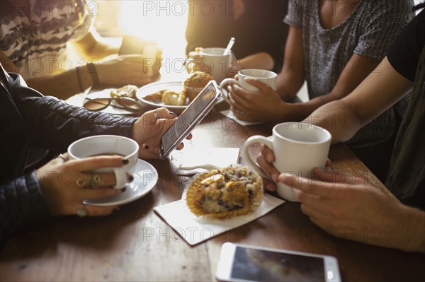 Group of friends in cafe.