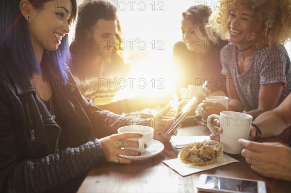 Group of friends in cafe.