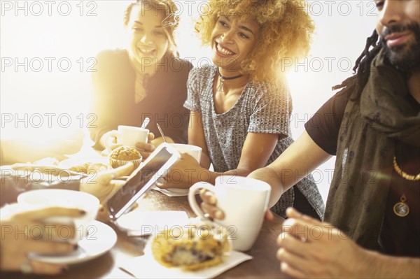 Group of friends in cafe.