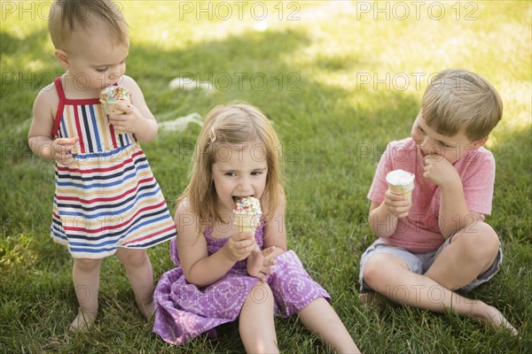 Children (18-23 months, 2-3, 4-5) eating ice-cream