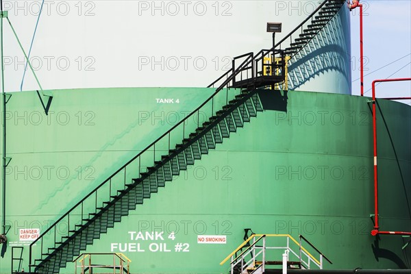 Stairs on wall of oil storage tank