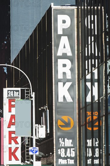 USA, New York State, New York City, Signs at entrance to parking garage