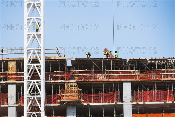 USA, New York State, New York City, Manhattan, People working on construction site