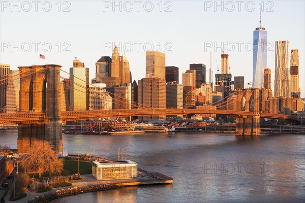 USA, New York State, New York City, Brooklyn Bridge and Manhattan at dawn