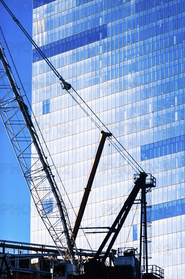 USA, New York State, New York City, Manhattan, Detail of crane and office building