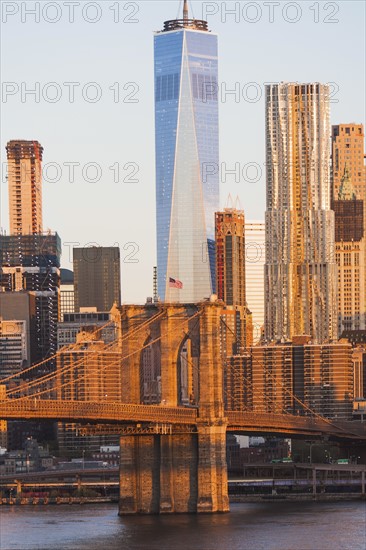 USA, New York State, New York City, Manhattan, Cityscape with Brooklyn Bridge at sunrise