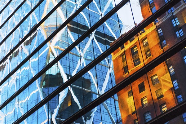 USA, New York, New York City, Glass facade of office building