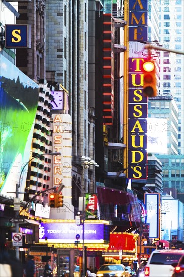 USA, New York, New York City, Times square, 42nd street, Neon lights and advertisements on street