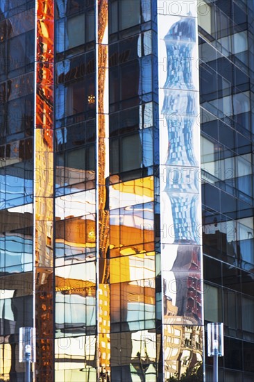 USA, New York, New York City, Glass facade of office building
