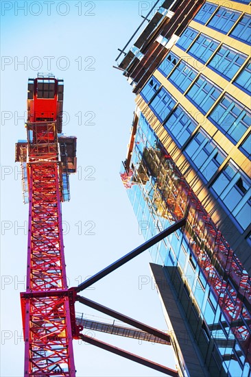 USA, New York, New York City, Office building next to crane