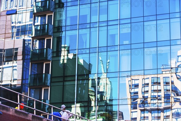 USA, New York, New York City, Glass facade of office building