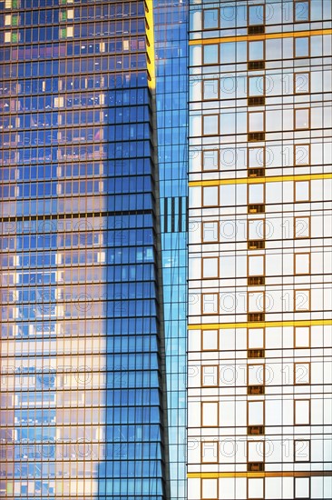 USA, New York, New York City, Glass facade of office building