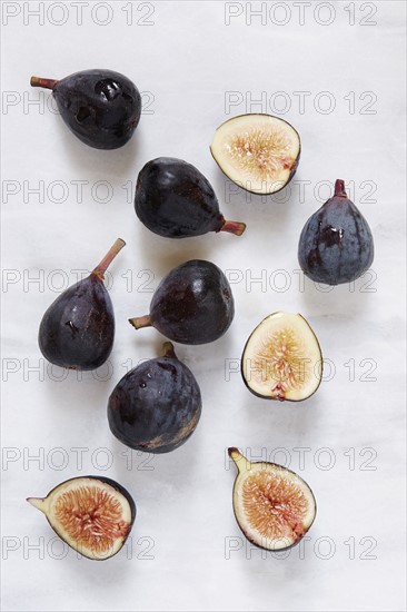 Figs lying on marble table