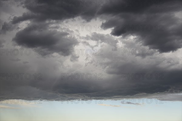 Storm clouds gathering on late evening sky