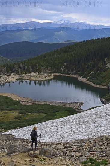 USA, Colorado, Idaho Springs, Hiker looking at view from Saint Mary's Glacier