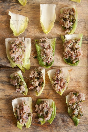 Greek appetizer on wooden cutting board