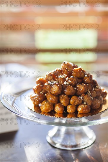 Loukoumades, greek dessert on platter