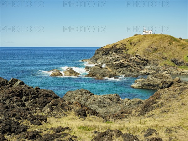 Australia, New South Wales, Port Macquarie, Lighthouse on rocky coat