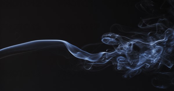 Smoke on black background.