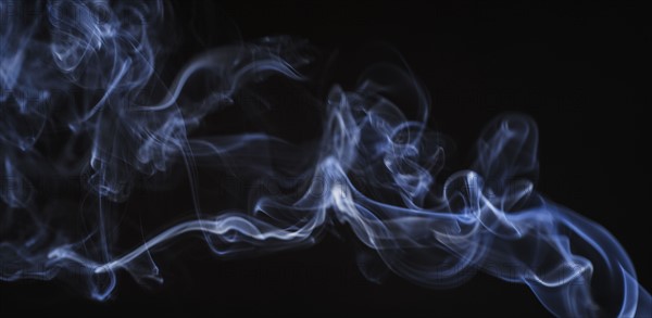 Smoke on black background.