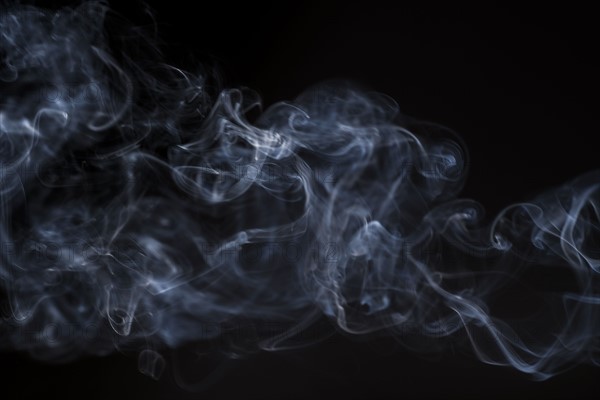 Smoke on black background.