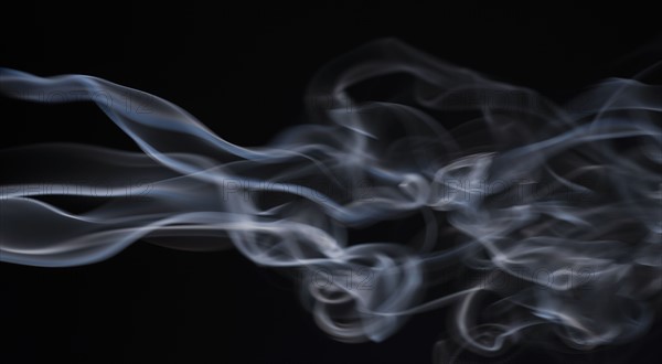 Smoke on black background.