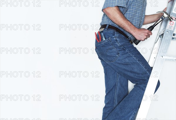 Man climbing on ladder.