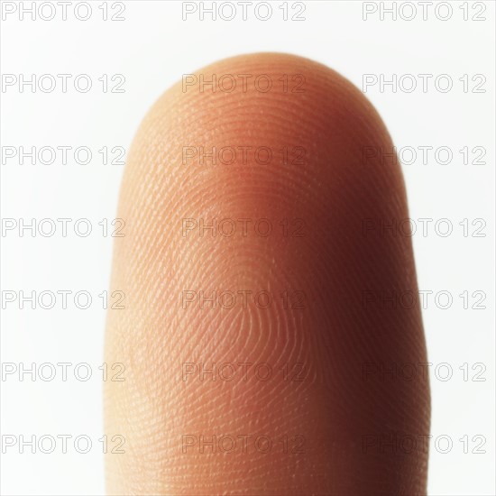 Close-up view of fingertip.