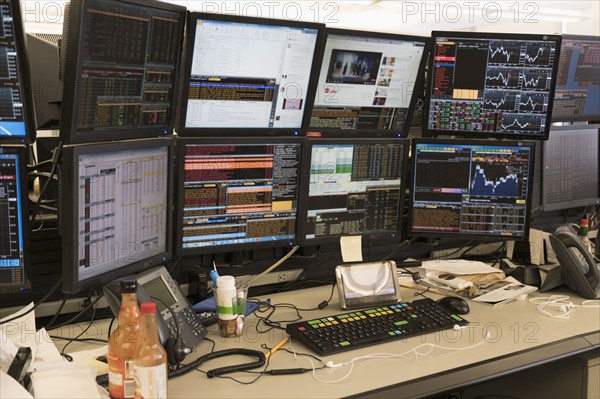 Desk with arrangement of computer monitor.