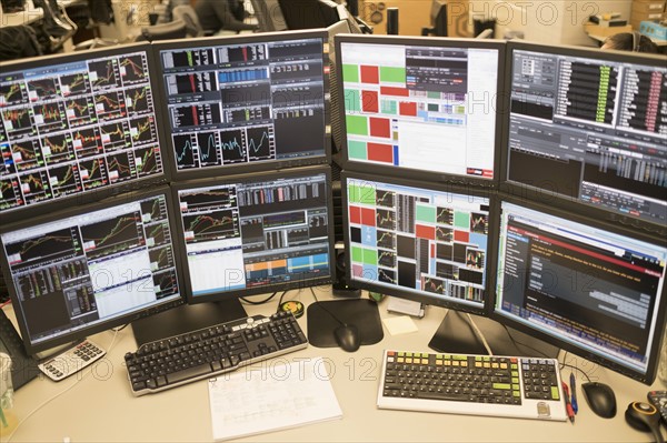 Desk with arrangement of computer monitor.