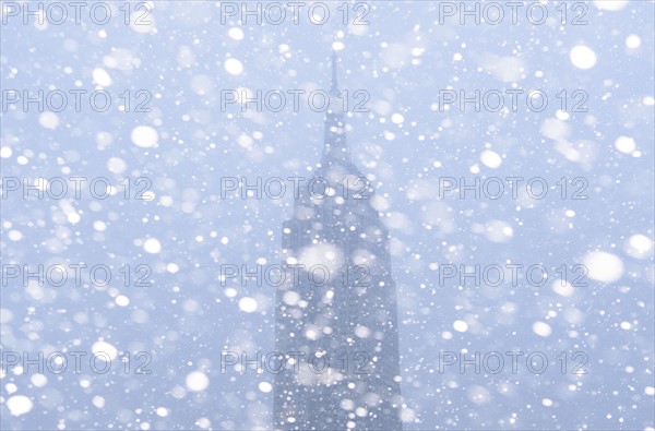 USA, New York State, New York City, Empire State Building in snow.