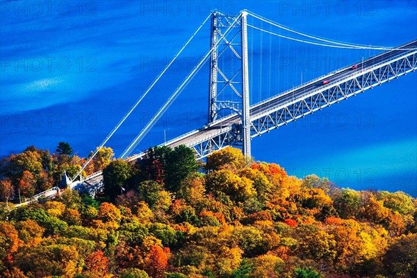 USA, New York, Bear Mountain with bridge above blue river