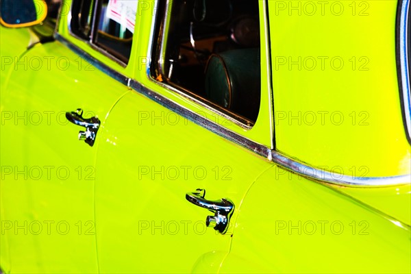 Doors and windows of green car